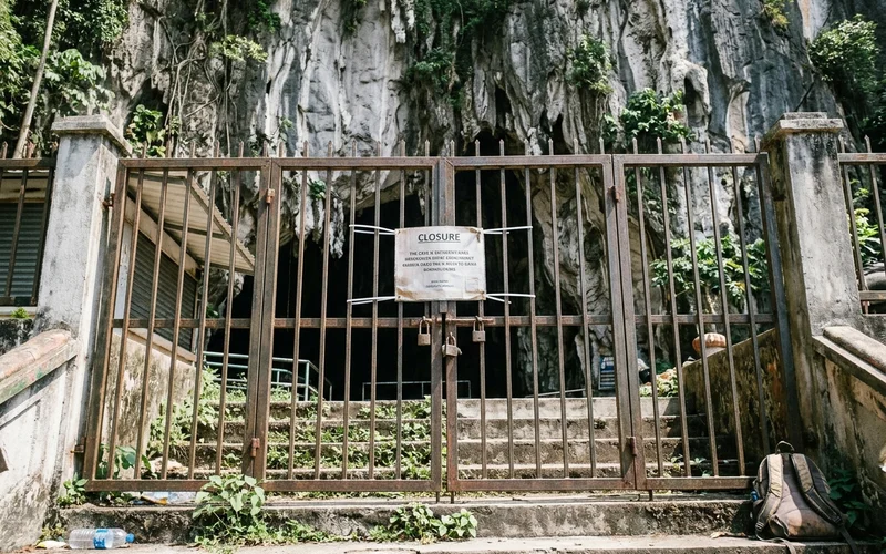 The closed, gated entrance to the former Dark Cave at Batu Caves