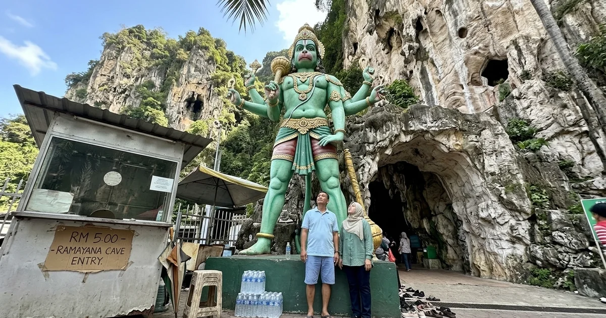 The green Hanuman statue at the entrance to Ramayana Cave, Batu Caves