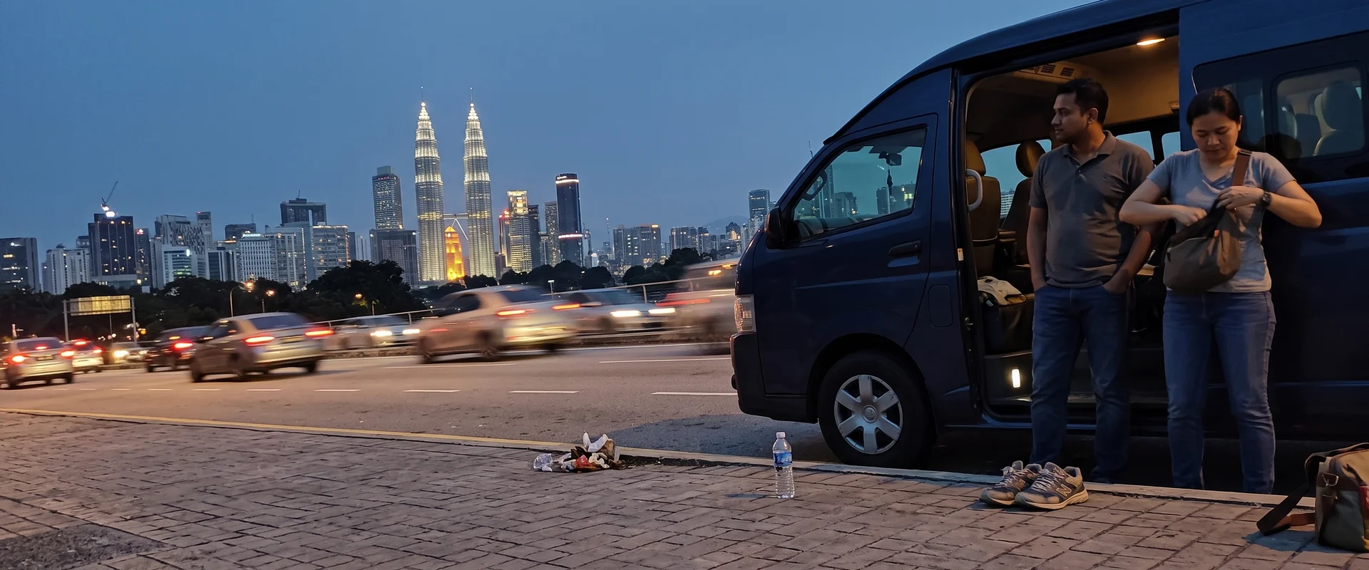 Kuala Lumpur skyline at dusk, the second half of a Batu Caves combo day